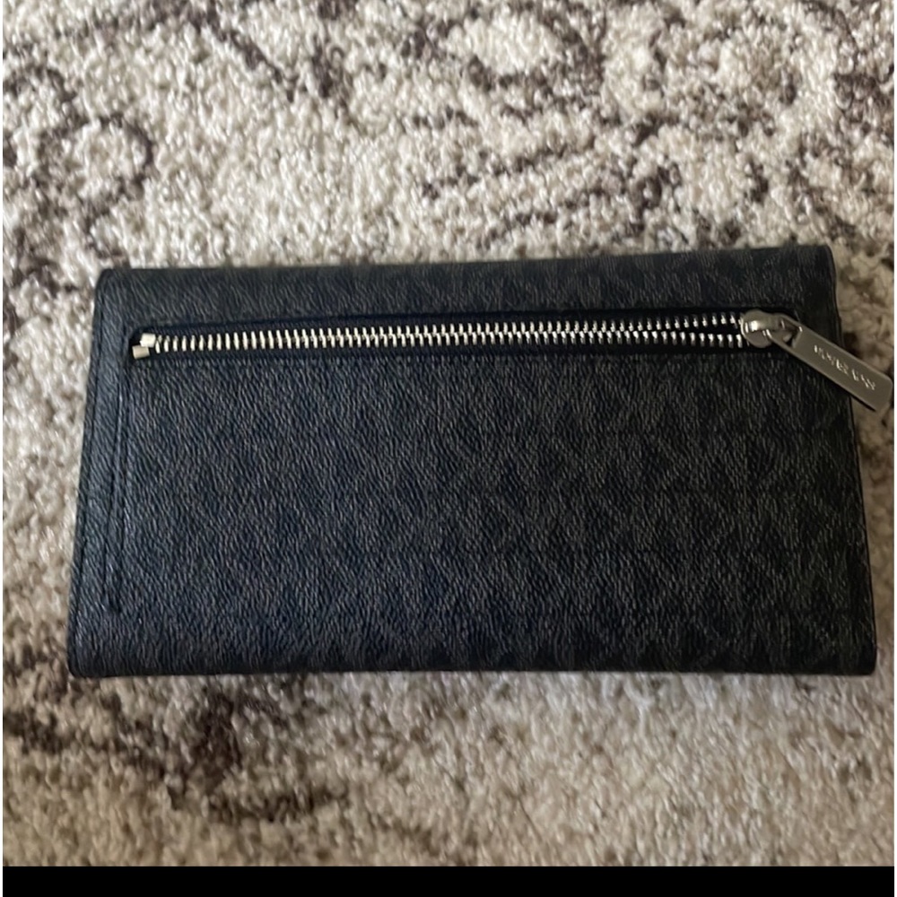 Like new. Black Michael kors wallet. Just has been in my closest.